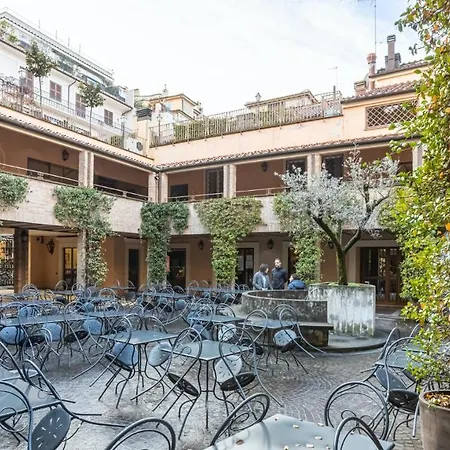 Plum Guide - The Roman Marmotta * Rome